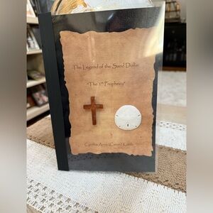 The legend of The Sand Dollar the Ist prophecy paperback book by Cynthia Anne